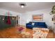 Inviting living room with hardwood floors, stylish decor, and comfortable blue sofa at 821 Mark St, Belmont, NC 28012