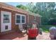 Relaxing backyard patio with outdoor seating and string lights, perfect for entertaining at 821 Mark St, Belmont, NC 28012