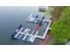 Aerial view featuring covered boat slips at a private residence, offering convenient water access at 8271 Camelia Ln, Denver, NC 28037