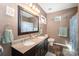 Bathroom with granite countertop and double sinks at 833 Old Charlotte Sw Rd, Concord, NC 28027