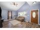 Inviting living room with high ceilings, lots of natural light, and luxury vinyl flooring at 833 Old Charlotte Sw Rd, Concord, NC 28027