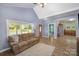 Inviting living room with luxury vinyl flooring and lots of natural light at 833 Old Charlotte Sw Rd, Concord, NC 28027