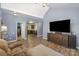 Inviting living room with luxury vinyl flooring that transitions to the eat in kitchen at 833 Old Charlotte Sw Rd, Concord, NC 28027