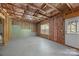 Unfinished basement, insulated walls and ceilings, white door to outside at 8453 Mossy Cup Trl, Harrisburg, NC 28075