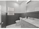 Modern bathroom featuring marble sink, elegant fixtures and natural light at 8453 Mossy Cup Trl, Harrisburg, NC 28075