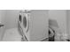 The laundry room includes a newer washer and dryer set with hookups at 8453 Mossy Cup Trl, Harrisburg, NC 28075