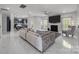Open concept living room that flows into kitchen at 8453 Mossy Cup Trl, Harrisburg, NC 28075