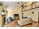 Inviting living room with vaulted ceilings, fireplace, and hardwood floors creates a cozy and open atmosphere at 8835 Glencroft Rd, Mint Hill, NC 28227