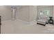 Bonus room with natural light and neutral tones, ideal for relaxation at 914 Elizabeth Ln, Matthews, NC 28105