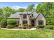 Charming home with a manicured lawn, stone accents, and a welcoming walkway at 914 Elizabeth Ln, Matthews, NC 28105