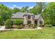 Beautiful home with manicured lawn and landscaping, showcasing its architectural details and curb appeal at 914 Elizabeth Ln, Matthews, NC 28105