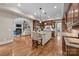 Gourmet kitchen with large island, granite countertops, stainless steel appliances, and ample cabinet space at 914 Elizabeth Ln, Matthews, NC 28105