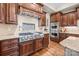 Gourmet kitchen with stainless steel appliances and custom wood cabinetry at 914 Elizabeth Ln, Matthews, NC 28105