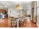 Open floorplan with dining room leading to living room and kitchen at 10210 Roosevelt Dr, Huntersville, NC 28078