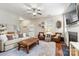 Bright and spacious living room with comfortable seating and contemporary decor at 10210 Roosevelt Dr, Huntersville, NC 28078