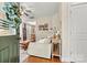 Tastefully decorated living room with hardwood floors and ample seating at 10210 Roosevelt Dr, Huntersville, NC 28078