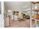 Inviting living room featuring hardwood floors, a comfortable couch, and stylish decor at 10210 Roosevelt Dr, Huntersville, NC 28078