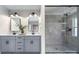 This bathroom features double sinks, grey cabinets, modern fixtures and a glass enclosed shower at 1033 Harrogate Dr, Bessemer City, NC 28016