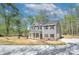 Beautiful two-story home with gray siding, black shutters, and a well-manicured front yard at 1033 Harrogate Dr, Bessemer City, NC 28016