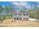 Charming two-story home with covered front porch and manicured landscaping at 1033 Harrogate Dr, Bessemer City, NC 28016