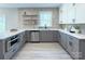 Well-lit kitchen with a stainless steel appliances, neutral cabinets, and granite countertops at 1033 Harrogate Dr, Bessemer City, NC 28016