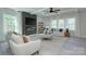 Comfortable living room featuring modern decor, a fireplace, and an open layout at 1033 Harrogate Dr, Bessemer City, NC 28016