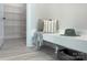 Cozy mudroom includes a built-in bench with pillows and blanket, and storage at 1033 Harrogate Dr, Bessemer City, NC 28016