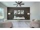 Beautifully staged home office with trendy decor, accent wall, and ample natural light at 1033 Harrogate Dr, Bessemer City, NC 28016