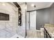 Modern bathroom features gray tile shower, and a large contemporary shower system at 107 Maurice St, Monroe, NC 28112