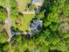 A picturesque aerial view of a charming home nestled in a lush, green neighborhood at 108 Tall Oak Dr, Mooresville, NC 28117