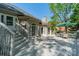 A spacious back deck features stairs and a dining area to enjoy outdoor living at 108 Tall Oak Dr, Mooresville, NC 28117