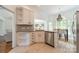 Bright eat-in kitchen features stone countertops, stainless steel appliances, and an open concept design at 108 Tall Oak Dr, Mooresville, NC 28117