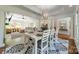Open-concept layout connects dining area to a spacious living room filled with natural light at 108 Tall Oak Dr, Mooresville, NC 28117