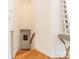 Light and airy staircase leading to the basement featuring hardwood stairs and white walls at 108 Tall Oak Dr, Mooresville, NC 28117