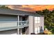 Charming condo featuring a balcony, light siding, and a newly installed roof at 11163 Harrowfield Rd # 8198, Charlotte, NC 28226