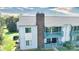 A lovely view of a condo with a chimney and dual level outdoor balconies at 11163 Harrowfield Rd # 8198, Charlotte, NC 28226