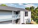 Charming condo featuring a balcony, light siding, and a newly installed roof at 11163 Harrowfield Rd # 8198, Charlotte, NC 28226