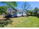 The welcoming front porch is perfect for enjoying the neighborhood ambiance and outdoor relaxation at 1143 N College Ave, Newton, NC 28658