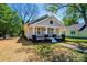 Lovely home with a inviting front porch, and well-manicured lawn, providing a perfect outdoor retreat at 1143 N College Ave, Newton, NC 28658