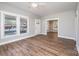 Inviting living room with wood floors and plenty of natural light streaming through the windows at 1143 N College Ave, Newton, NC 28658
