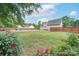 Spacious backyard featuring a pristine in-ground pool and privacy fence at 1228 Quiet Acres Rd, Rock Hill, SC 29732