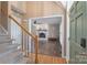 Inviting foyer with stairs leading to the upper level, and an archway to a cozy living room at 1228 Quiet Acres Rd, Rock Hill, SC 29732