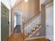 Foyer with wooden floors, and a carpeted staircase at 1228 Quiet Acres Rd, Rock Hill, SC 29732