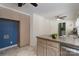 Kitchen with granite counters, stainless dishwasher, tan cabinets, and tile flooring at 1228 Quiet Acres Rd, Rock Hill, SC 29732