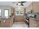 Well-lit kitchen featuring granite countertops and stainless steel appliances at 1228 Quiet Acres Rd, Rock Hill, SC 29732