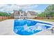 Backyard pool with diving board, fenced in yard and beautiful home at 1228 Quiet Acres Rd, Rock Hill, SC 29732