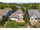 Aerial view of a home with lush greenery, and a patio perfect for enjoying outdoor living at 12614 Robert Walker Dr, Davidson, NC 28036