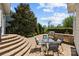 Outdoor dining with pavers, built in bbq, and landscaping create an inviting backyard space at 12614 Robert Walker Dr, Davidson, NC 28036