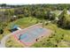 Community basketball court surrounded by green space, playground, and picnic shelter at 12614 Robert Walker Dr, Davidson, NC 28036