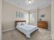 Cozy bedroom with neutral walls, carpet flooring and ample natural light at 12614 Robert Walker Dr, Davidson, NC 28036